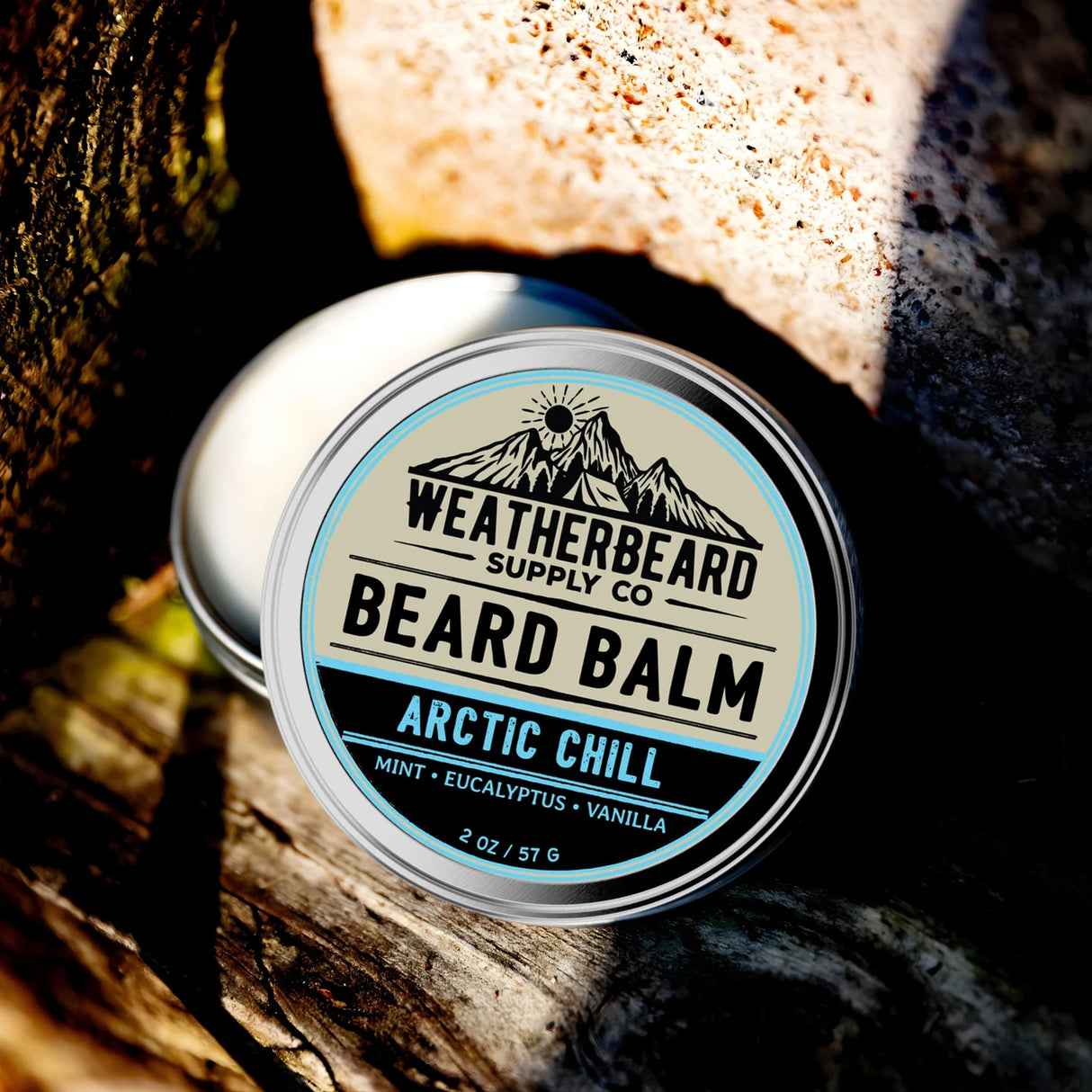 Tin of Weatherbeard Supply Co. Arctic Chill Beard Balm on a wooden surface