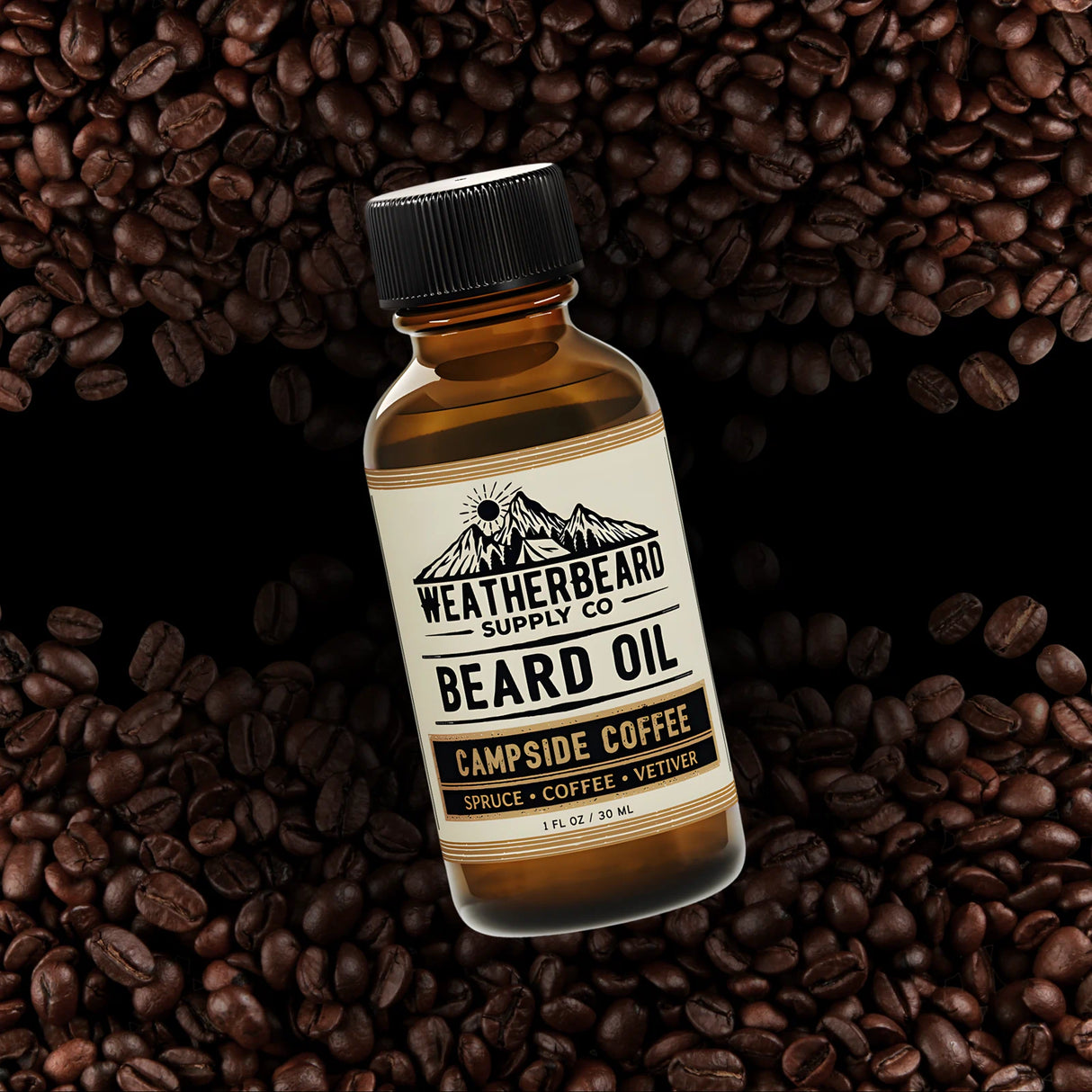 Bottle of Weatherbeard Supply Co. Campside Coffee beard oil surrounded by coffee beans