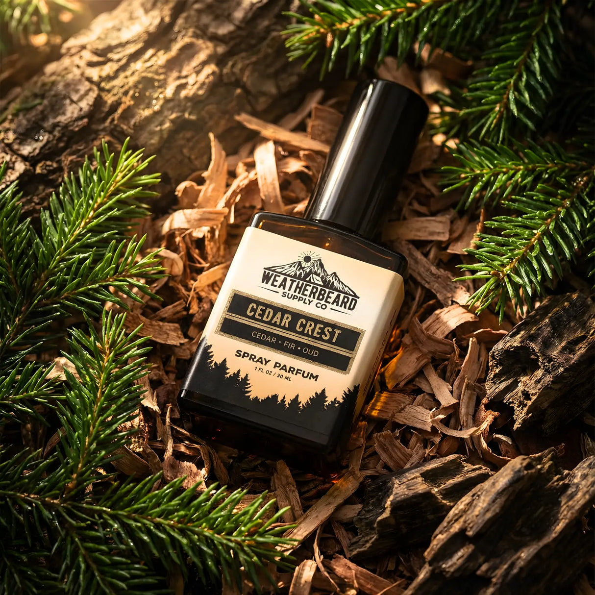 Weatherbeard Supply Co. Cedar Crest spray parfum bottle surrounded by cedar branches and wood chips.