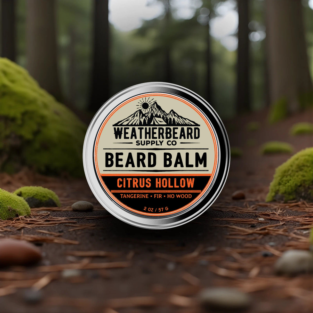 Weatherbeard Supply Co Citrus Hollow beard balm sitting in a forest setting