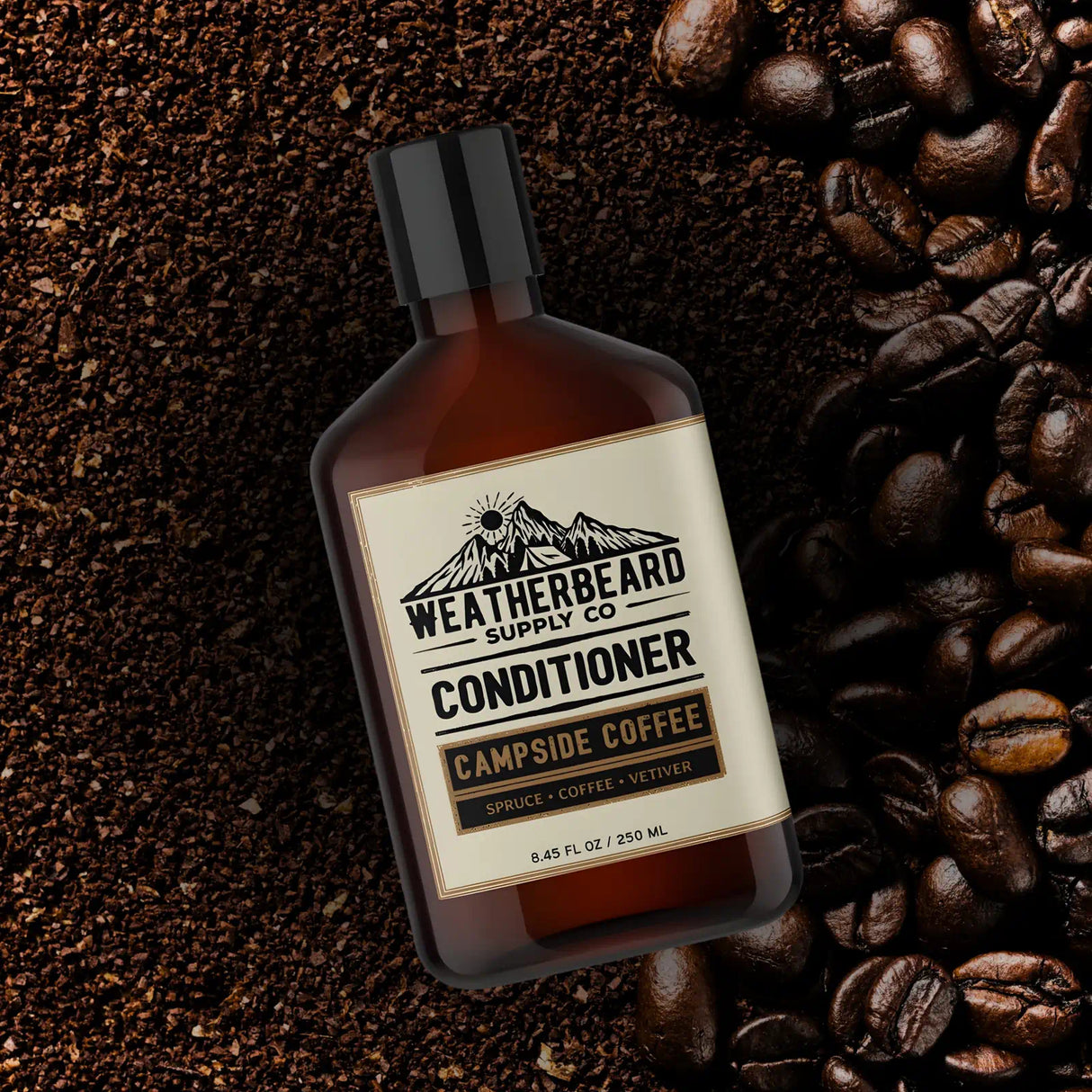 Bottle of Weatherbeard Supply Co Campside Coffee Beard Conditioner surrounded by coffee beans