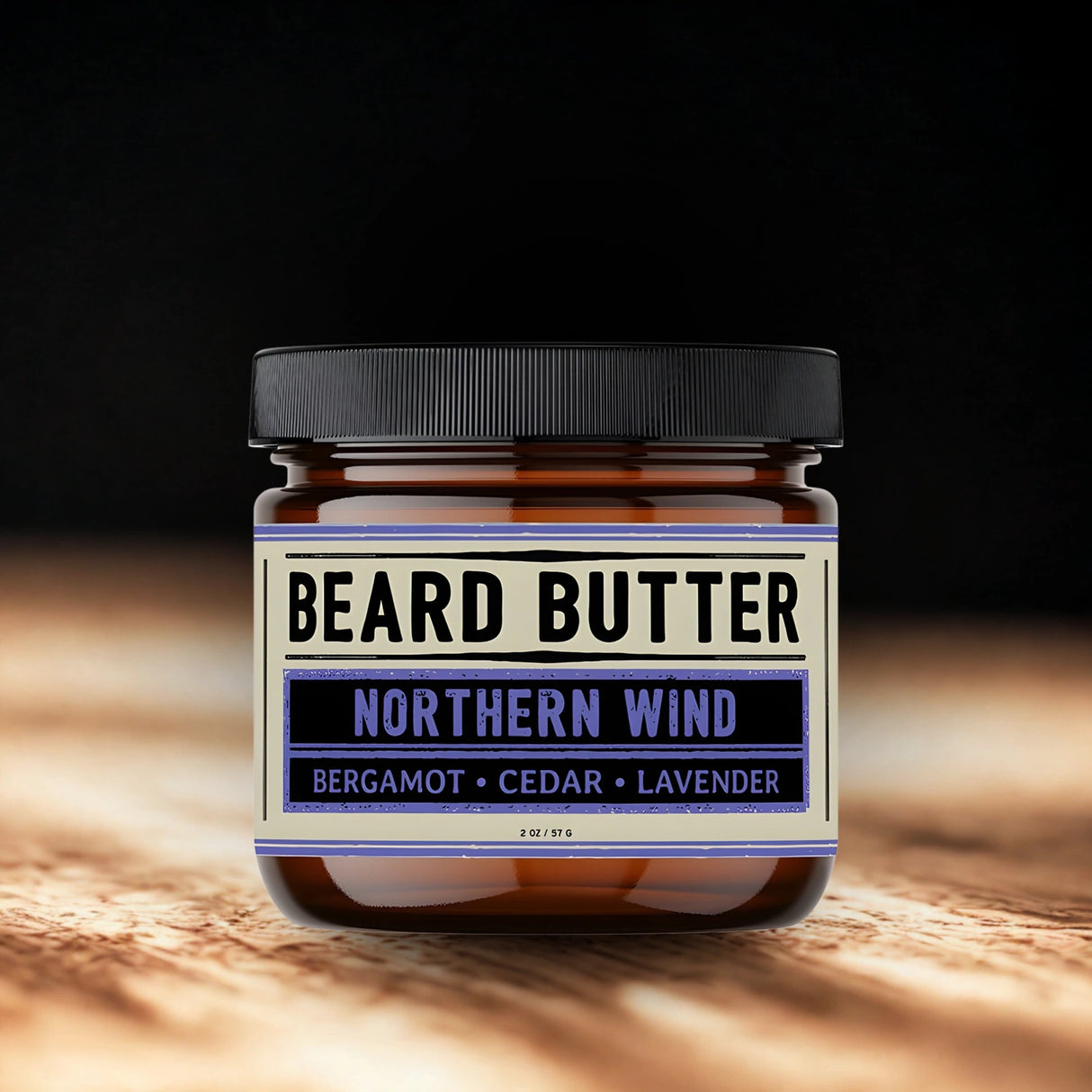 Jar of beard butter labeled 'Northern Wind' on a wooden surface with a dark background