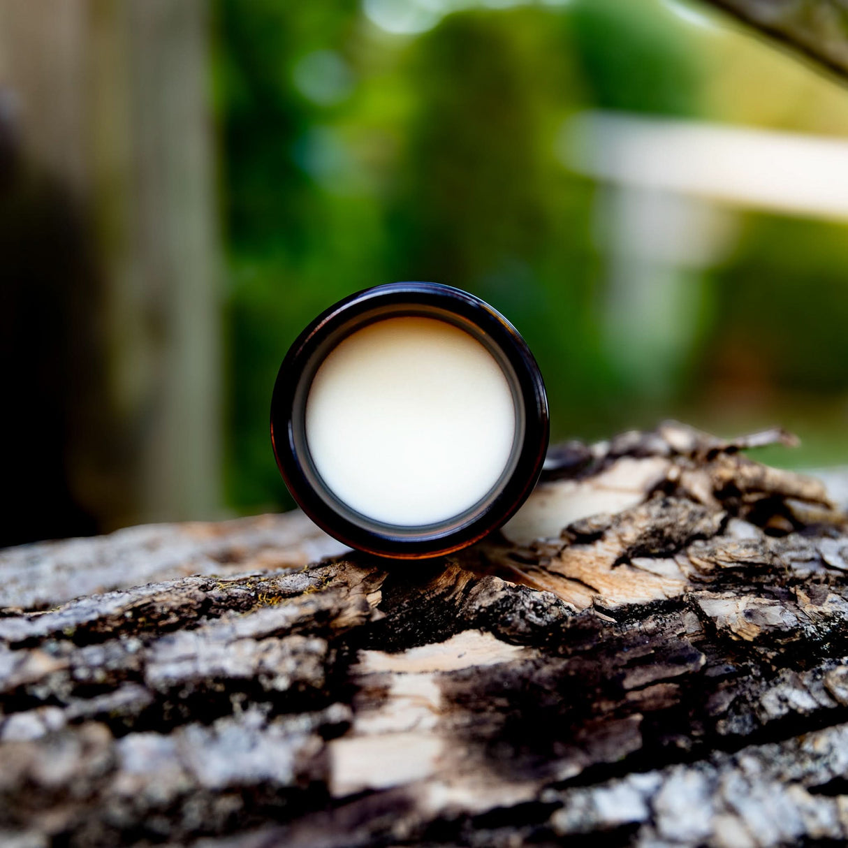 Open jar of Weatherbeard Supply Co Beard Butter showing it's smooth, creamy texture.
