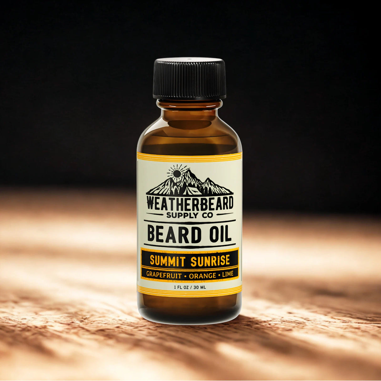 Bottle of Weatherbeard Supply Co. Summit Sunrise beard oil on a wooden surface with a dark background
