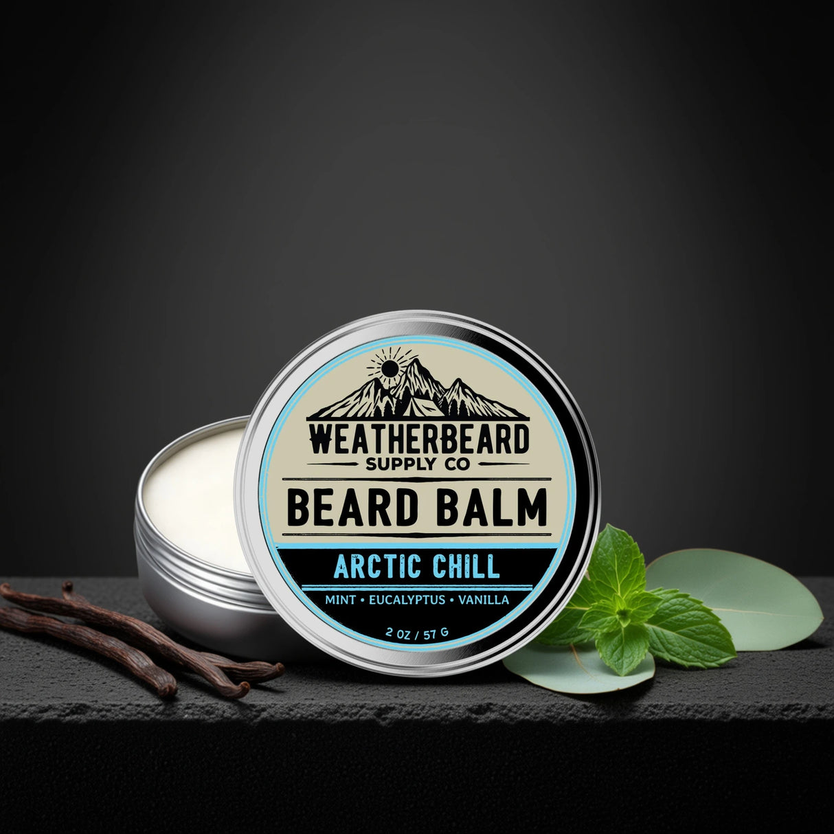 Arctic Chill Beard balm container with 'Weatherbeard Supply Co' branding on a dark background surrounded by vanilla bean and peppermint