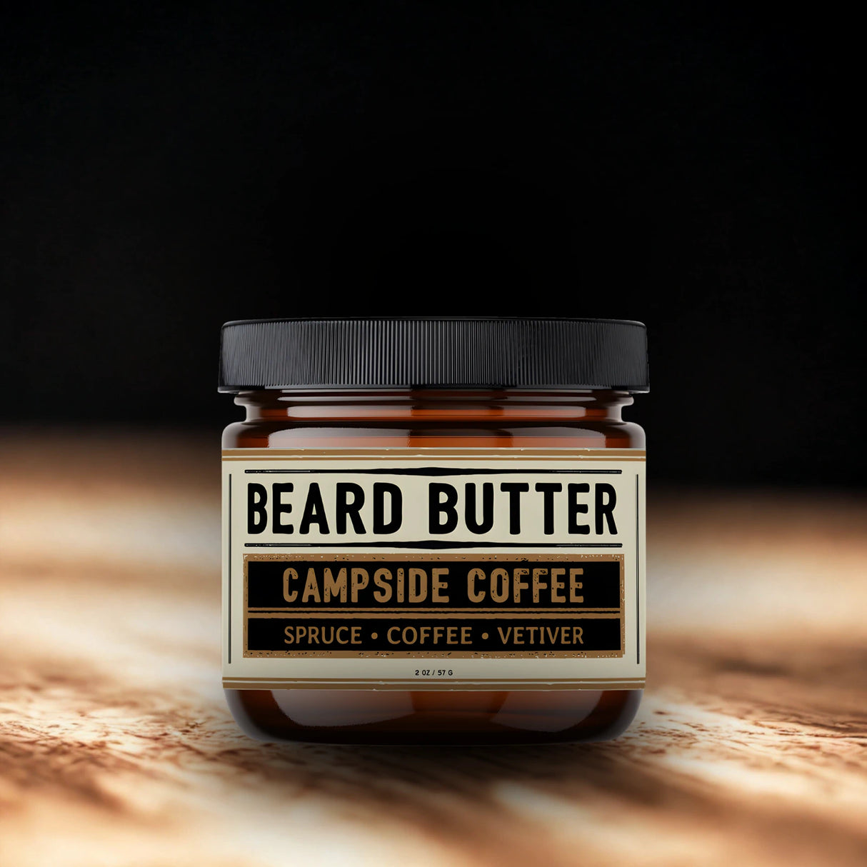 Jar of Weatherbeard Supply Co 'Campside Coffee' Beard Butter on a wooden surface with a dark background