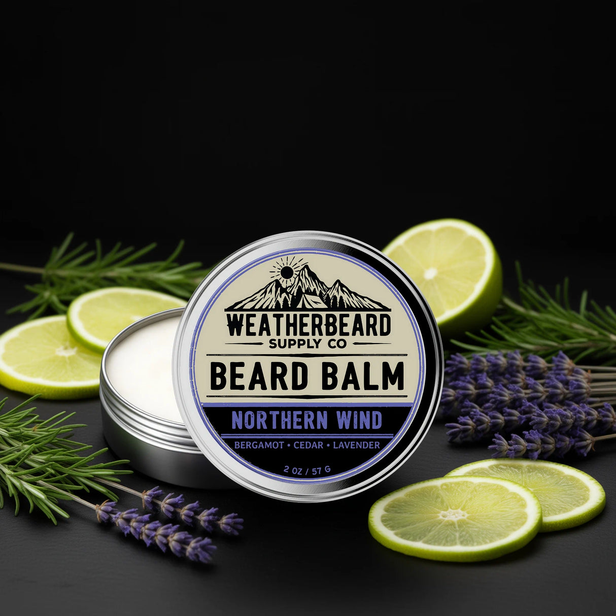Northern Wind Beard balm container with lavender and bergamot slices on a dark background