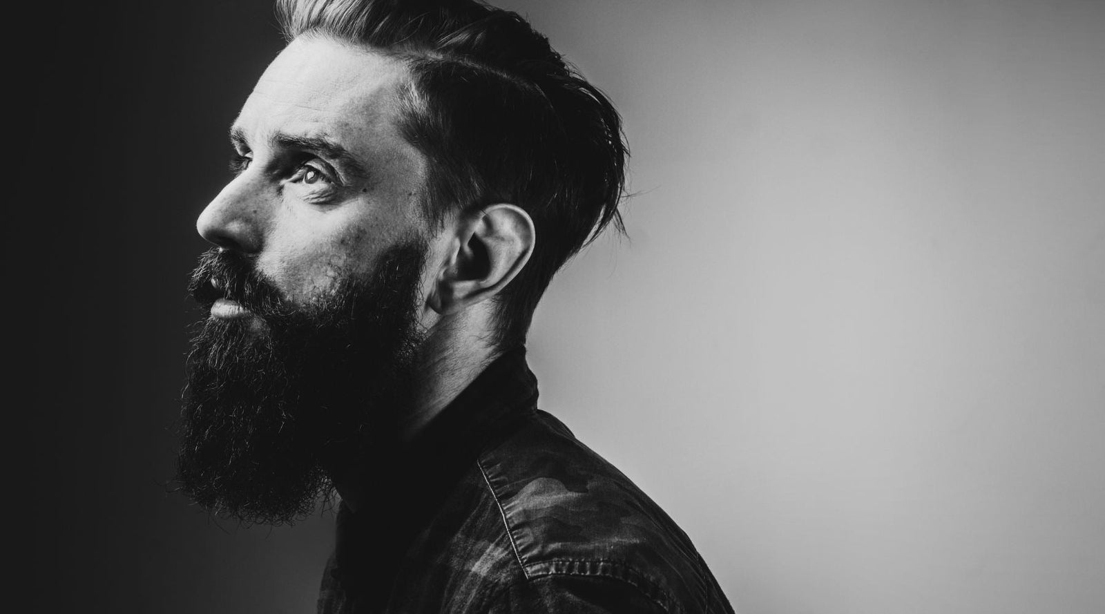 Black and white image of a bearded man