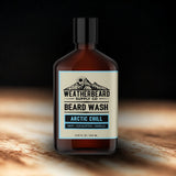 Bottle of Weatherbeard Supply Co. Arctic Chill beard wash on a dark background
