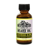 Bottle of Weatherbeard Supply Co's Backwoods Bloom Beard Oil Against A White Background
