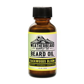 Bottle of Weatherbeard Supply Co's Backwoods Bloom Beard Oil Against A White Background