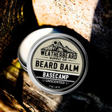 Tin of Weatherbeard Supply Co. Unscented Beard Balm on a wooden background