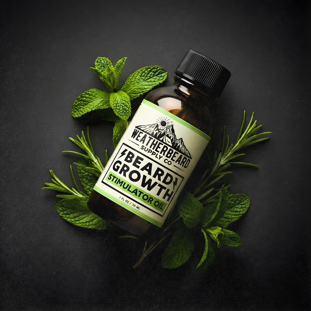 Bottle of Weatherbeard Supply Co. beard growth stimulator oil surrounded by peppermint leaves on a dark background