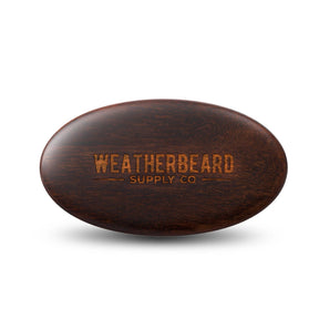 Boar hair beard brush with 'Weatherbeard Supply Co' branding on a white background