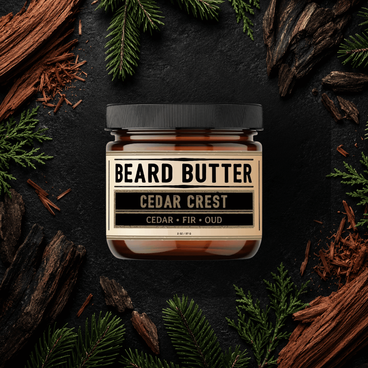 Jar of 'Cedar Crest' Beard Butter surrounded by cedarwood and fir needles on a dark background