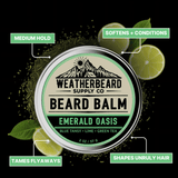 Weatherbeard Supply Co. Emerald Oasis beard balm container with lime slices and leaves on a black background