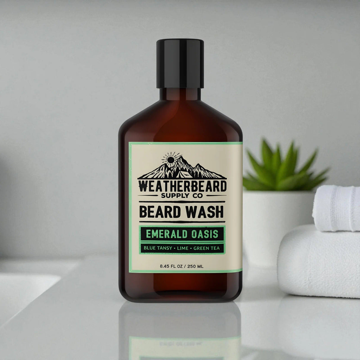 Bottle of Weatherbeard Supply Co. beard wash on a white bathroom counter with a succulent in the background