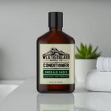 A bottle of Weatherbeard Beard Conditioner Sitting On A White Bathroom Counter with A Succulent in the Backgorund