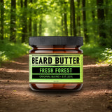 Jar of Weatherbeard Supply Co's Fresh Forest Beard Butter sitting in the forest