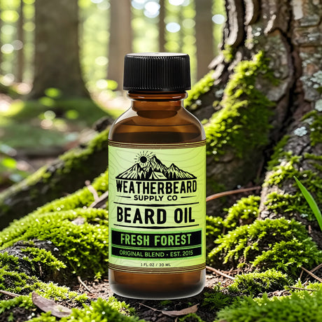 Bottle of Weatherbeard Supply Co. Fresh Forest beard oil on a mossy background