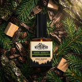 Weatherbeard Supply Co. Hinoki Heights spray parfum surrounded by spruce branches and wood