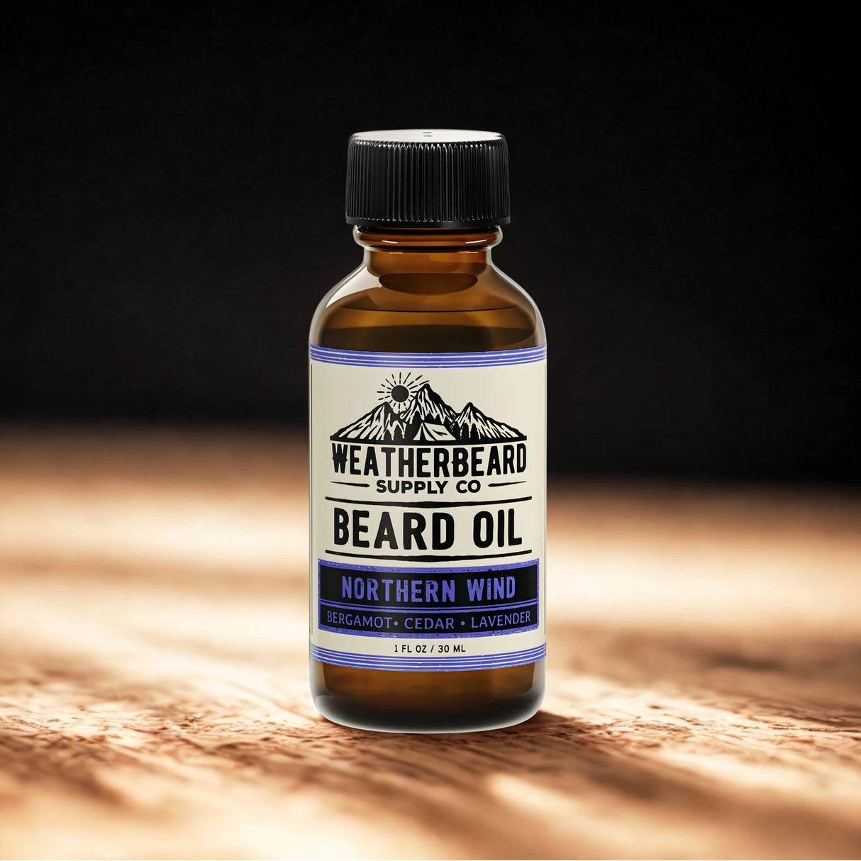 Bottle of Weatherbeard Supply Co. Northern Wind beard oil on a wooden surface with a dark background