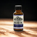 Bottle of Weatherbeard Supply Co. Northern Wind beard oil on a wooden surface with a dark background