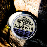 Tin of Weatherbeard Supply Co. Northern Wind Beard Balm on a textured surface