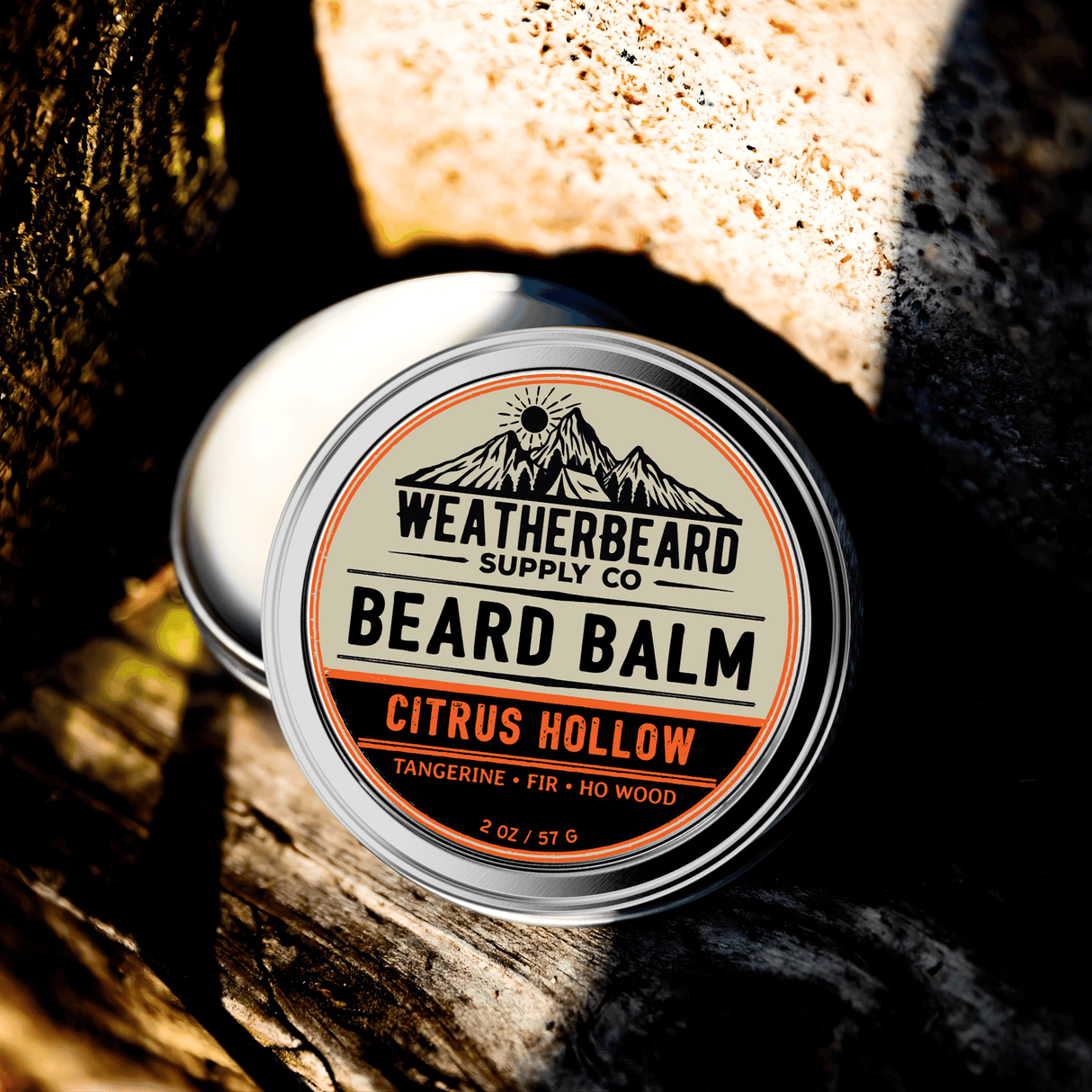 Weatherbeard Supply Co. Citrus Hollow Beard Balm container on a wooden surface