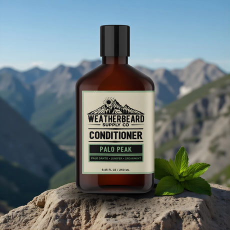Bottle of Weatherbeard Supply Co's beard conditioner with a mountainous background