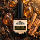 Weatherbeard Supply Co Amber Trail spray parfum surrounded by amber stones and wood.