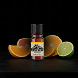 Bottle of Weatherbeard Supply Co. beard oil with oranges and a lime on a dark background