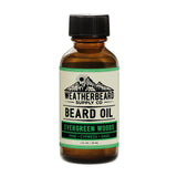 Bottle of Weatherbeard Supply Co. Evergreen Woods beard oil on a white background