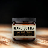 Jar of Weatherbeard Supply Co 'Campside Coffee' Beard Butter on a wooden surface with a dark background