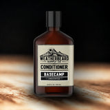 Bottle of Weatherbeard Supply Co. unscented beard conditioner with a mountain label on a dark background